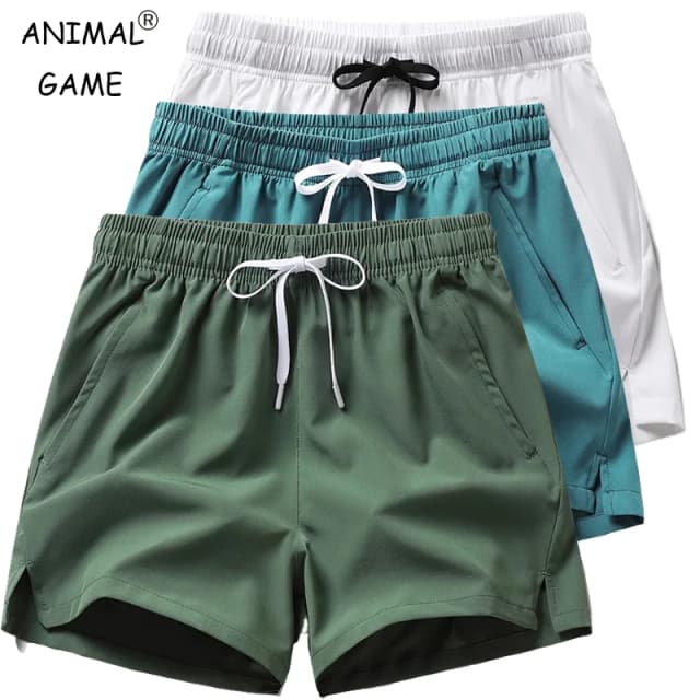 新しいメンズフィットネス軽量スウェットパンツ夏カジュアルポケットショーツ基本的な無地ショートパンツジョギングビーチショーツ男性
